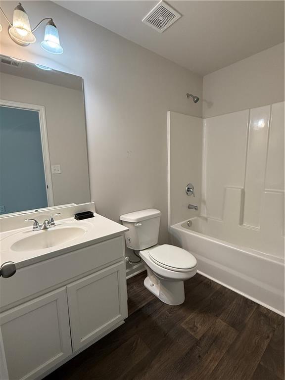 358 Mulberry Road Winder, GA 30680 - Photo 10 of 21 a bathroom with a toilet sink and mirror