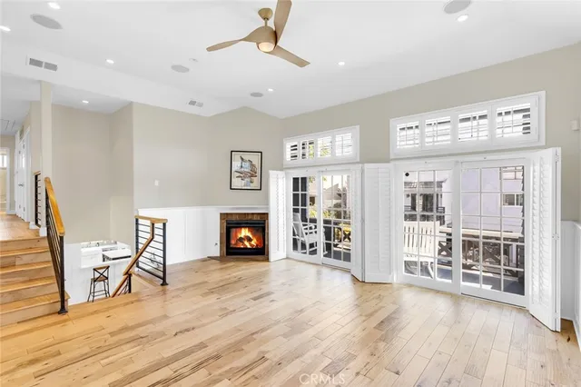 a view of a livingroom with furniture and a fireplace