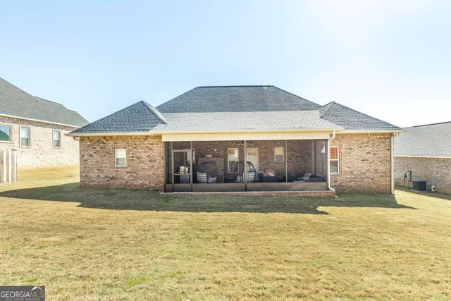 a view of a house with a swimming pool