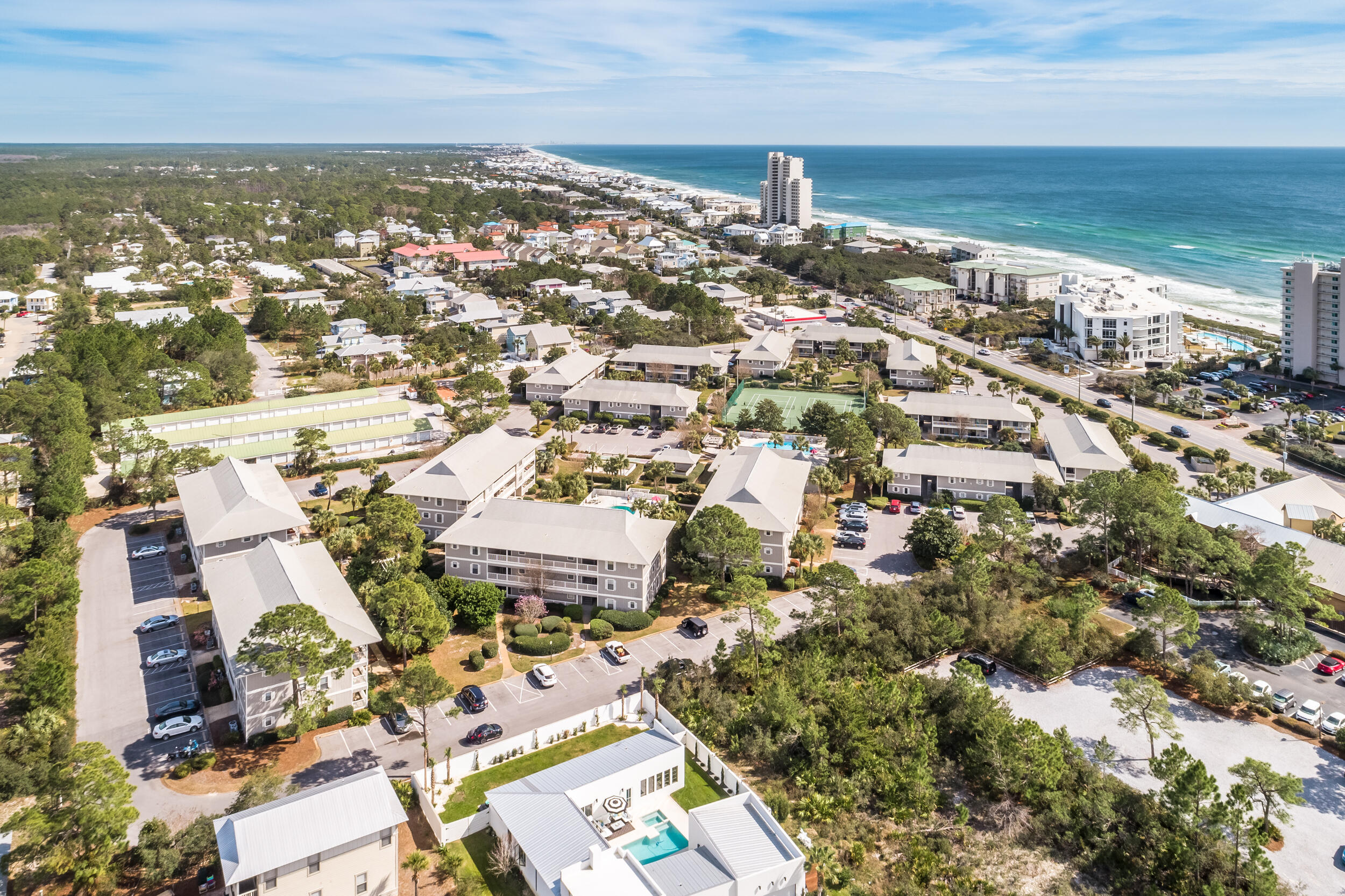 3799 East County Highway 30A, Unit C8 Santa Rosa Beach, FL 32459 - Photo 23 of 49 an aerial view of residential building with parking space