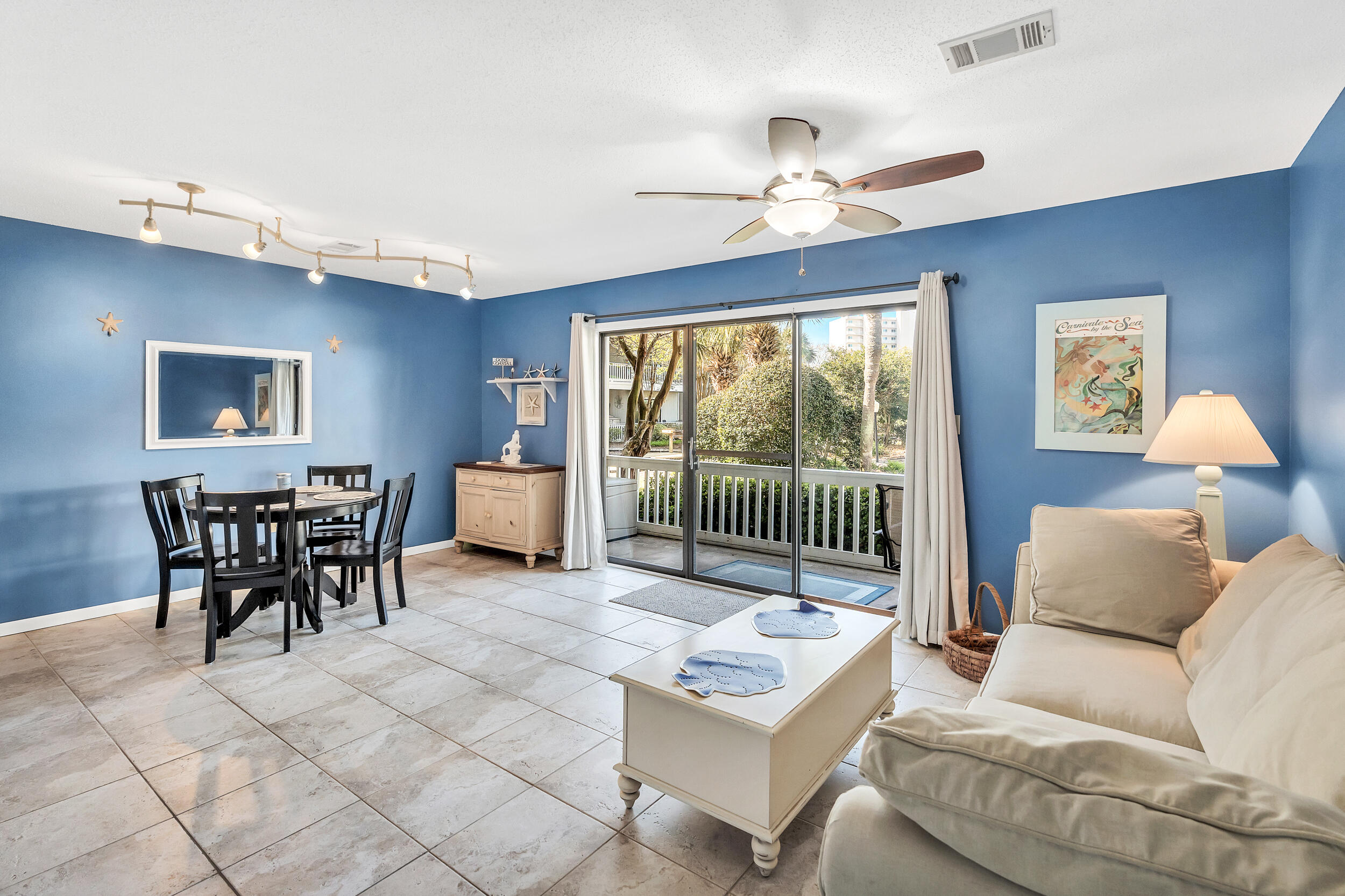 3799 East County Highway 30A, Unit C8 Santa Rosa Beach, FL 32459 - Photo 4 of 49 a living room with furniture and a window