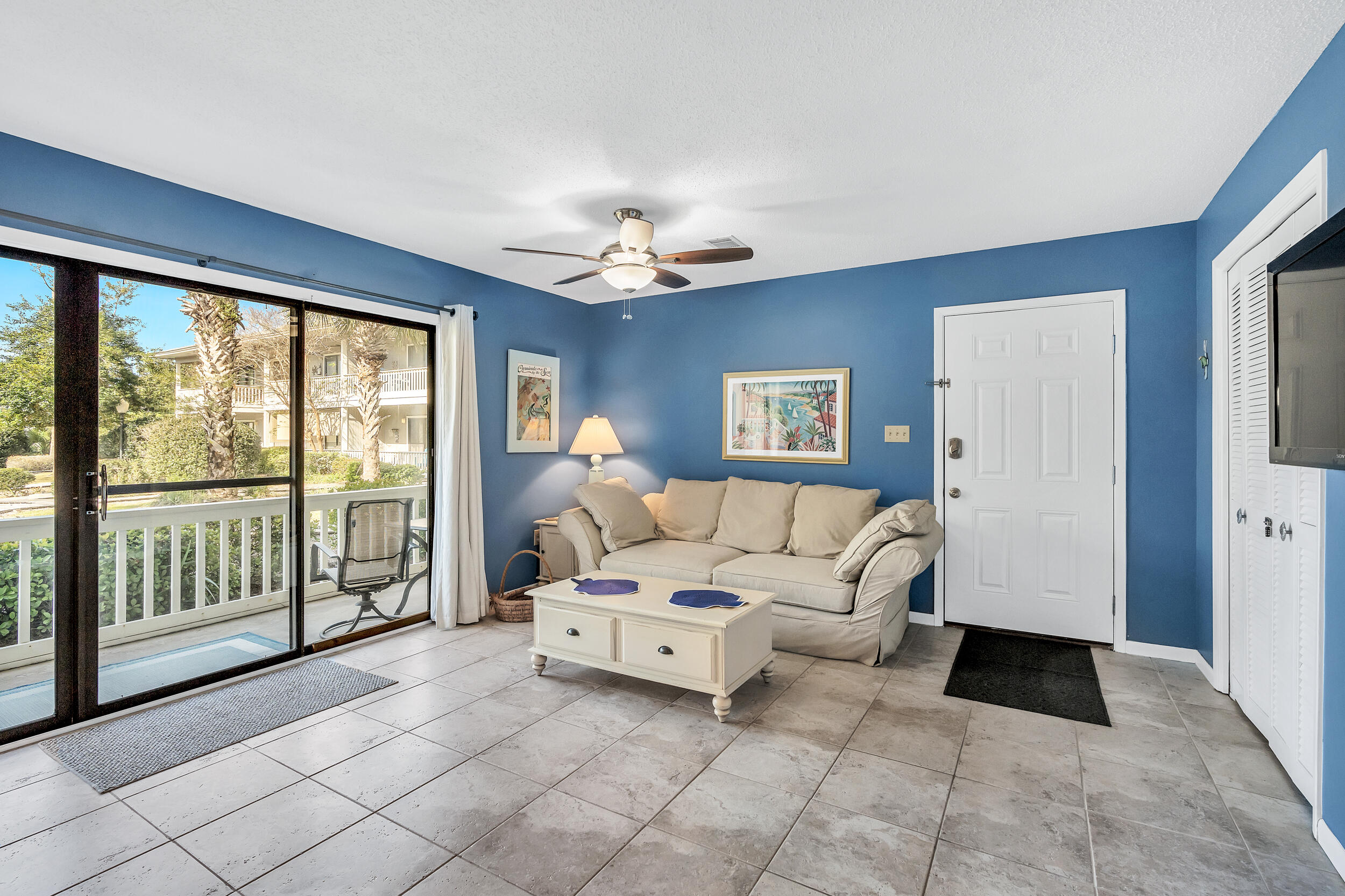 3799 East County Highway 30A, Unit C8 Santa Rosa Beach, FL 32459 - Photo 6 of 49 a living room with furniture and a large window