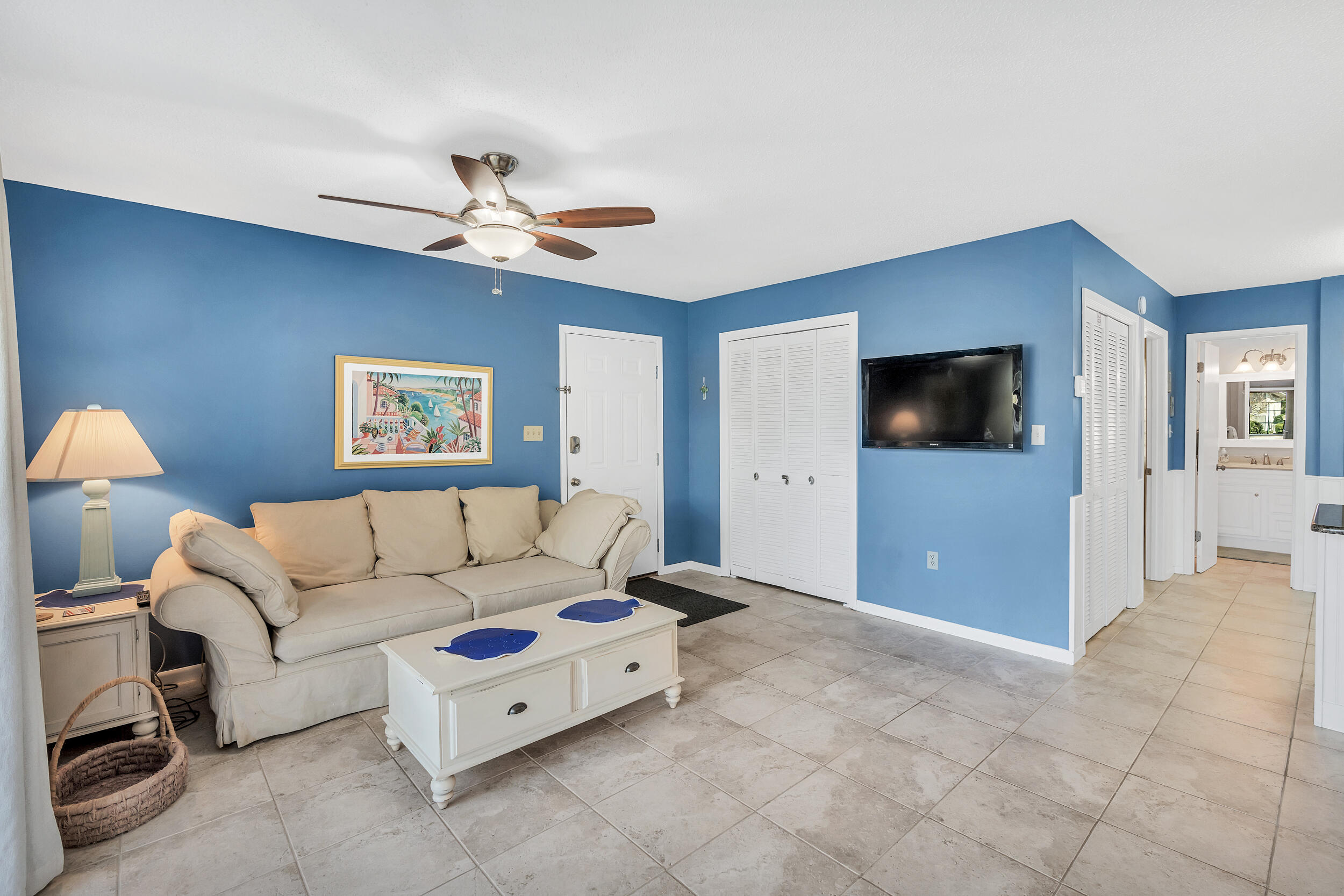 3799 East County Highway 30A, Unit C8 Santa Rosa Beach, FL 32459 - Photo 8 of 49 a living room with furniture and a flat screen tv