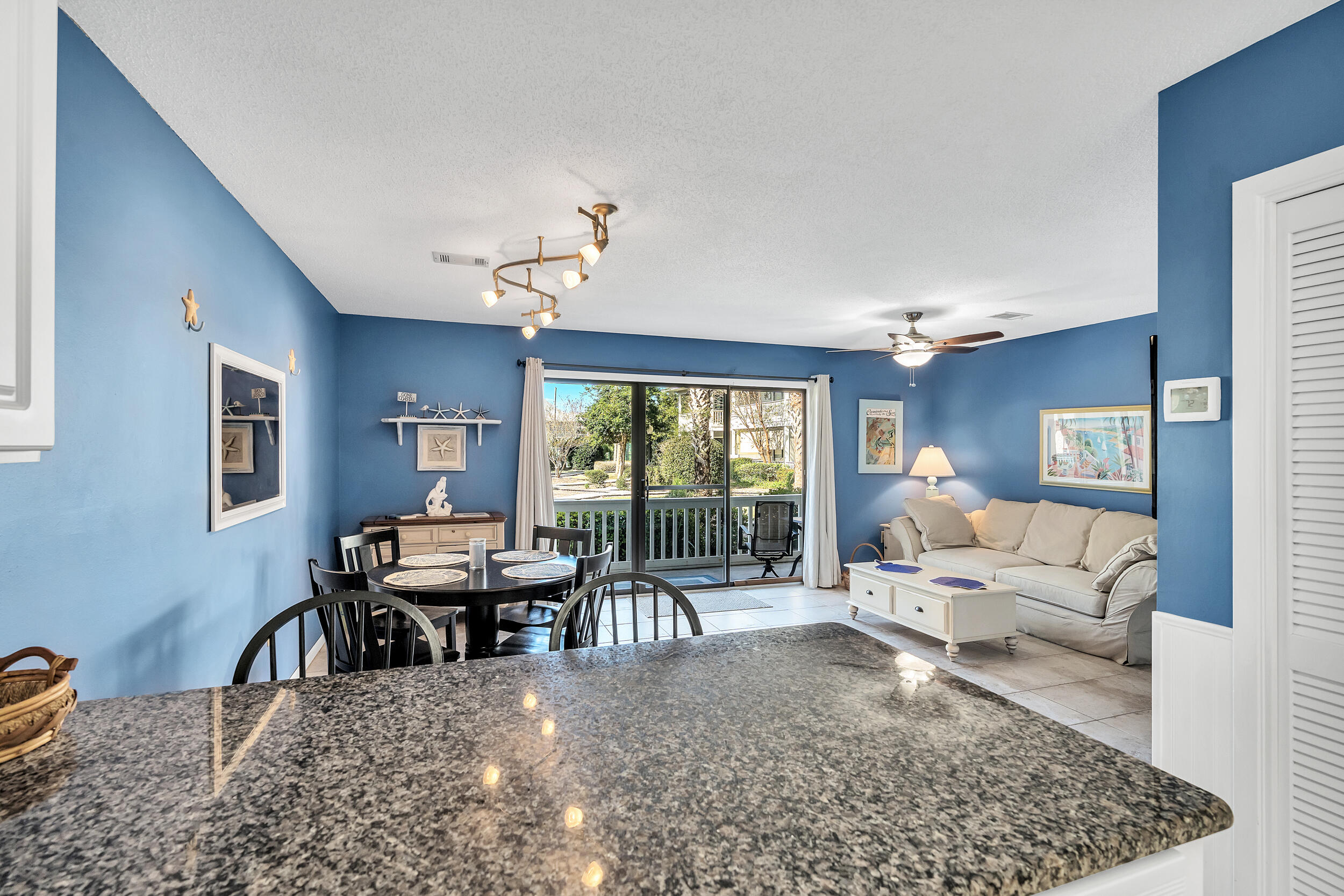 3799 East County Highway 30A, Unit C8 Santa Rosa Beach, FL 32459 - Photo 9 of 49 a living room with furniture and a large window