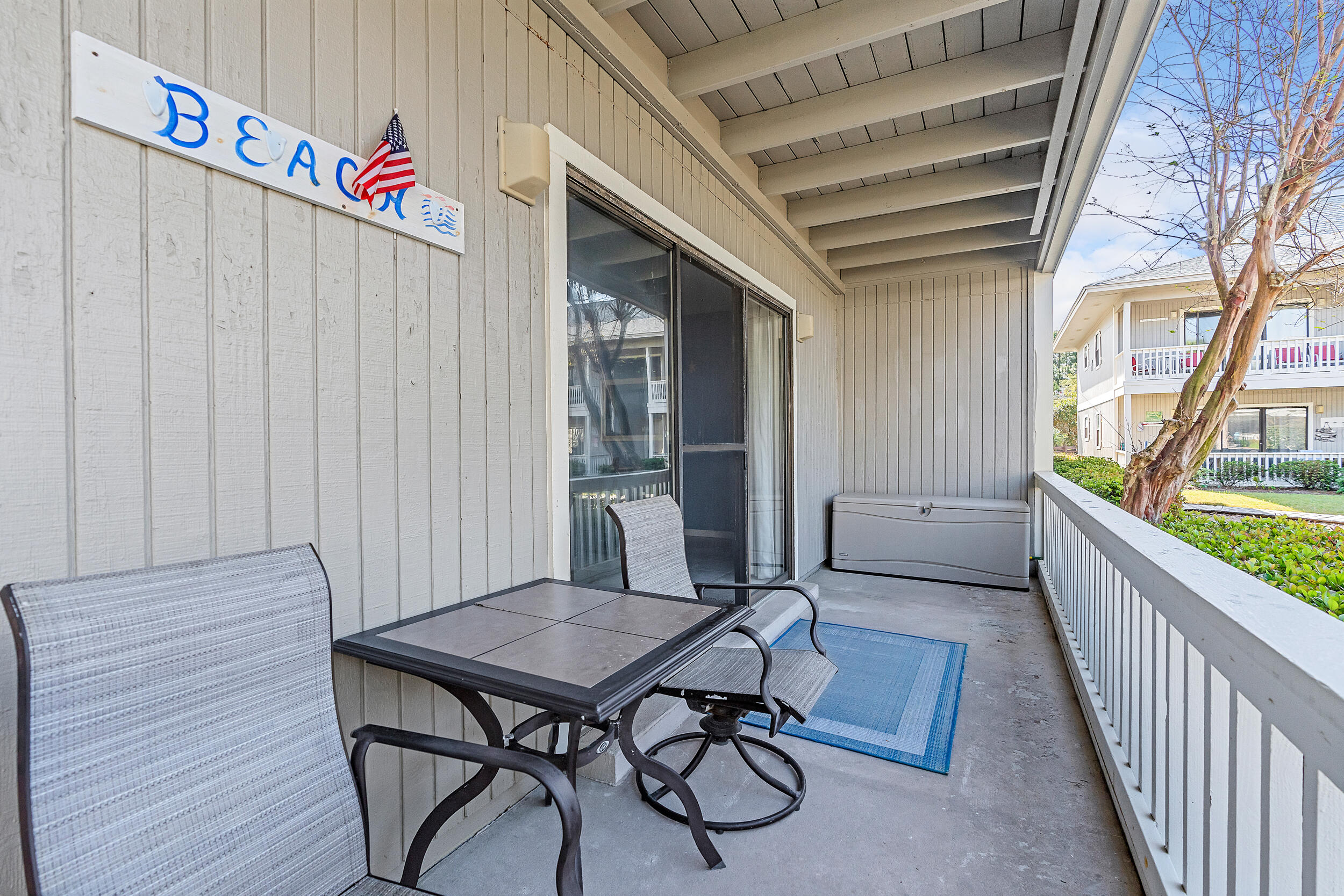 3799 East County Highway 30A, Unit C8 Santa Rosa Beach, FL 32459 - Photo 10 of 49 a view of a dining room with furniture window and wooden floor