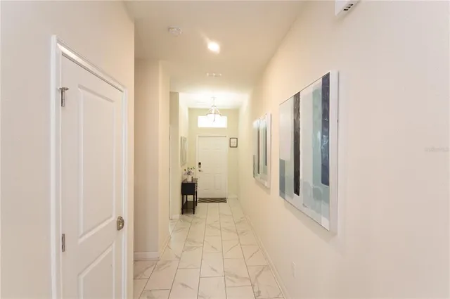a kitchen with stainless steel appliances kitchen island granite countertop a sink and cabinets