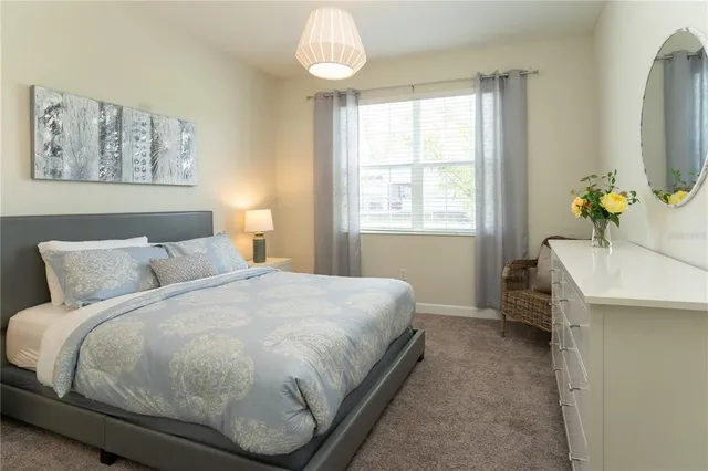 a view of a swimming pool with a yard