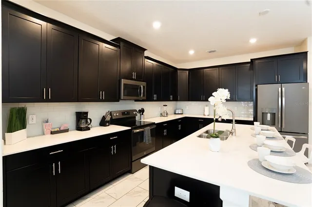a view of a dining room with furniture
