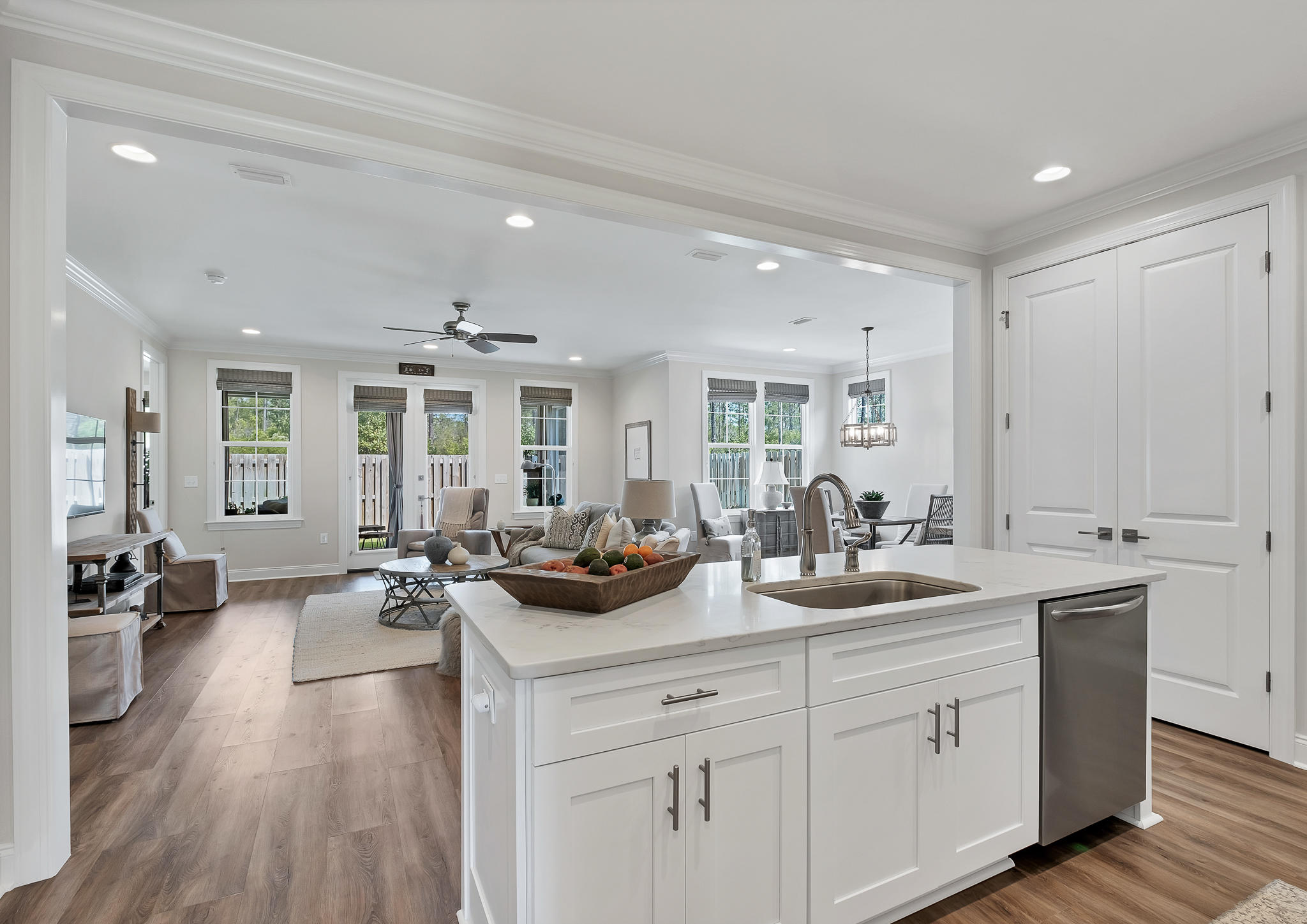 21 Windrow Way Inlet Beach Inlet Beach, FL 32461 - Photo 14 of 58 a open kitchen with sink stove and white cabinets with wooden floor