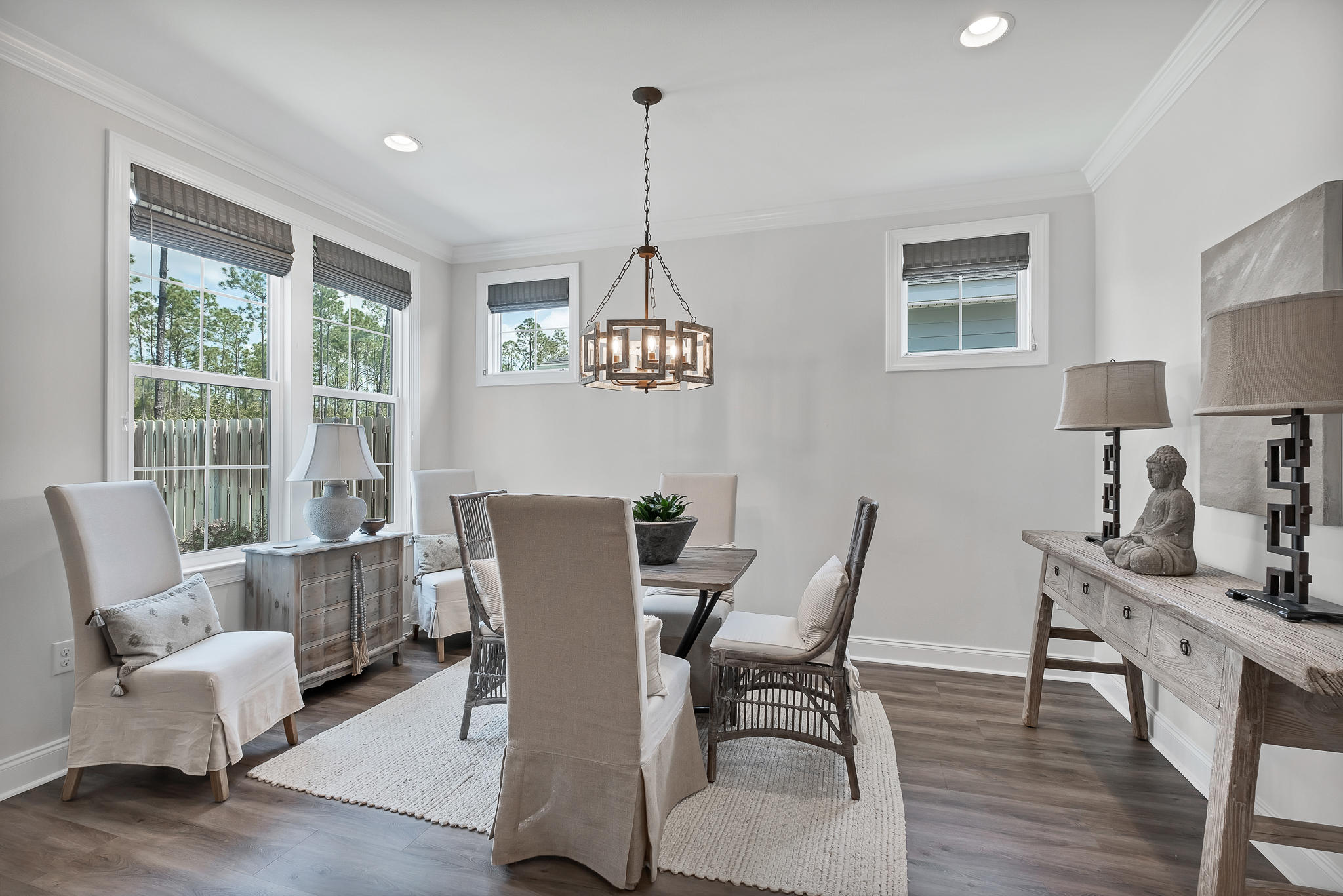 21 Windrow Way Inlet Beach Inlet Beach, FL 32461 - Photo 23 of 58 a dining room with furniture a chandelier and wooden floor
