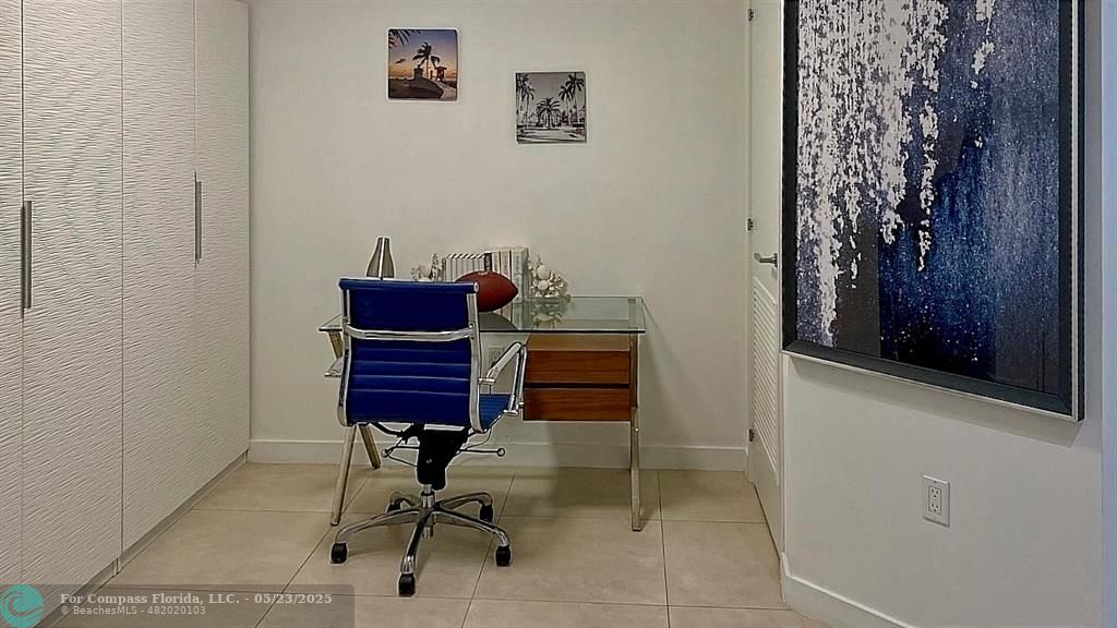 401 North Birch Road, Unit 415 Fort Lauderdale, FL 33304 - Photo 15 of 33 a view of a workspace with furniture