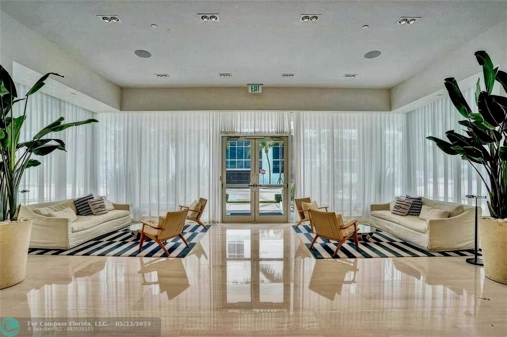 401 North Birch Road, Unit 415 Fort Lauderdale, FL 33304 - Photo 26 of 33 a living room with furniture