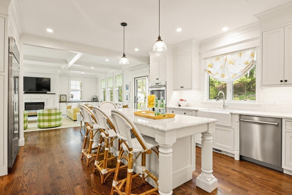 22 Richard Road Lexington, MA 02421 - Photo 15 of 42 a kitchen with stainless steel appliances granite countertop a stove a refrigerator a kitchen island a sink and a refrigerator