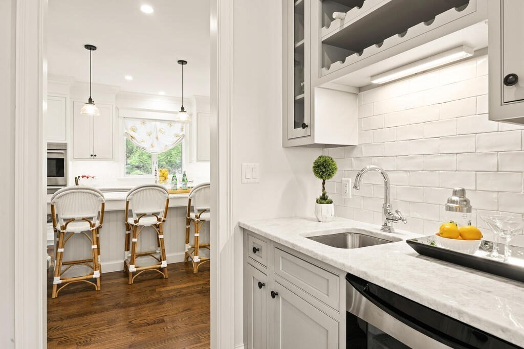 22 Richard Road Lexington, MA 02421 - Photo 18 of 42 a kitchen with a sink cabinets and window