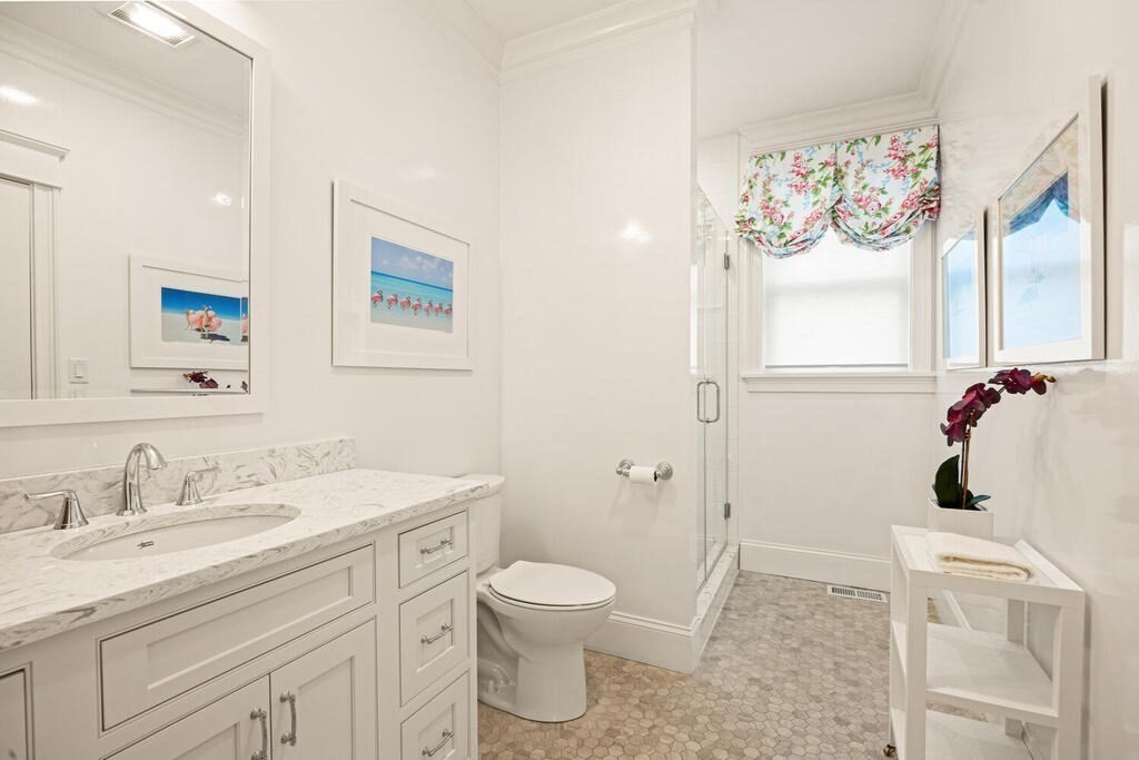 22 Richard Road Lexington, MA 02421 - Photo 21 of 42 a bathroom with a toilet sink vanity granite and shower