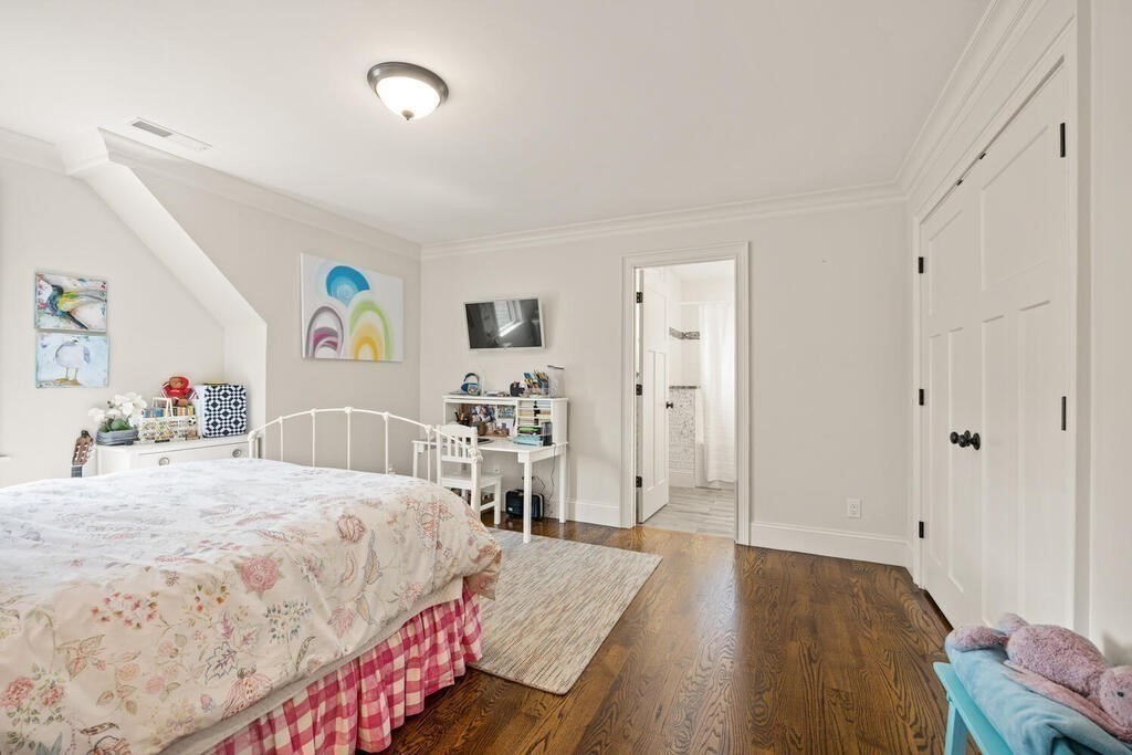 22 Richard Road Lexington, MA 02421 - Photo 27 of 42 a bedroom with a bed and a view of bathroom