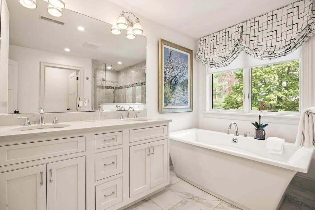 22 Richard Road Lexington, MA 02421 - Photo 34 of 42 a bathroom with a sink vanity and mirror