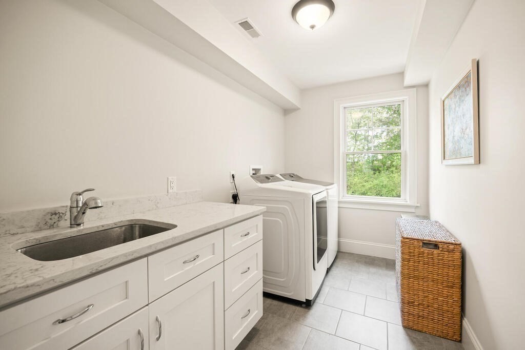 22 Richard Road Lexington, MA 02421 - Photo 35 of 42 a utility room with dryer and washer