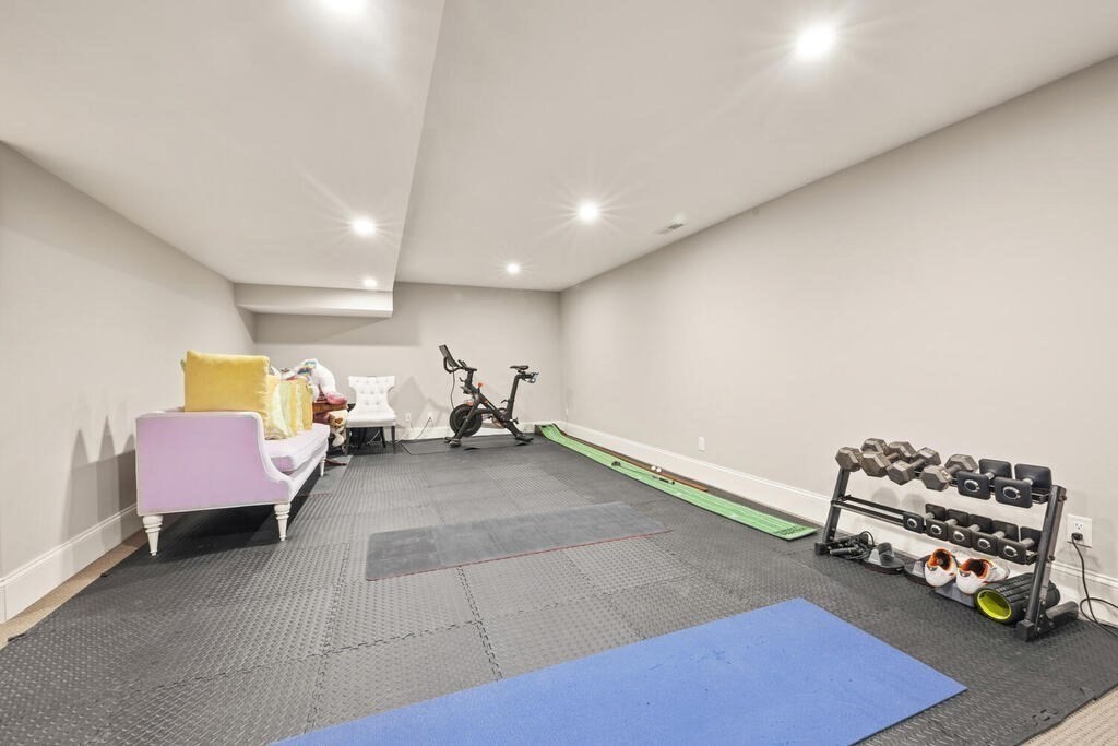 22 Richard Road Lexington, MA 02421 - Photo 36 of 42 a room with furniture and a couch