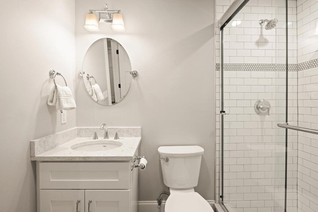 22 Richard Road Lexington, MA 02421 - Photo 38 of 42 a bathroom with a toilet sink and mirror