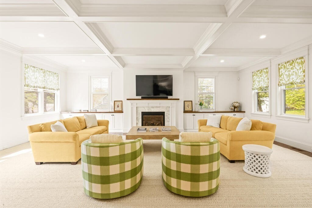 22 Richard Road Lexington, MA 02421 - Photo 7 of 42 a living room with furniture fireplace and a large window