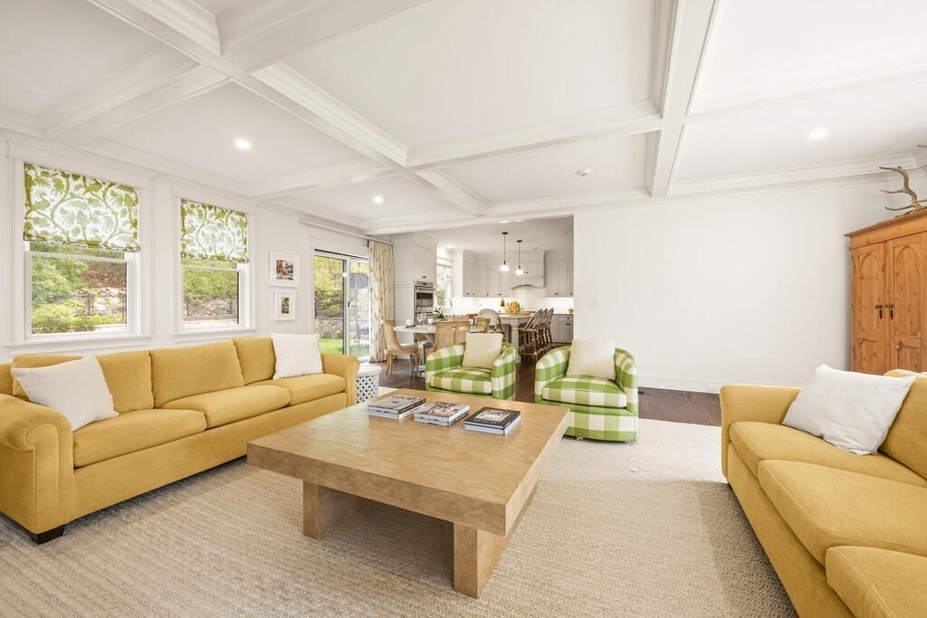 22 Richard Road Lexington, MA 02421 - Photo 9 of 42 a living room with furniture and a large window