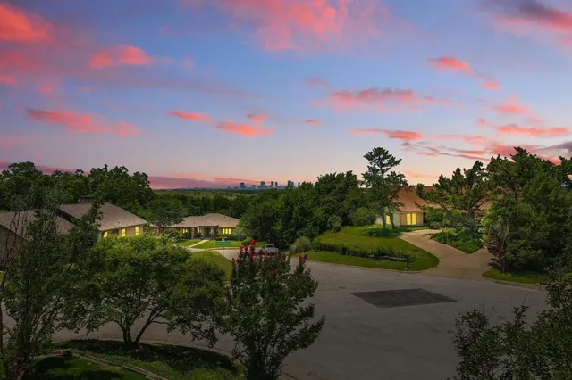 a view of a city and mountains in the background