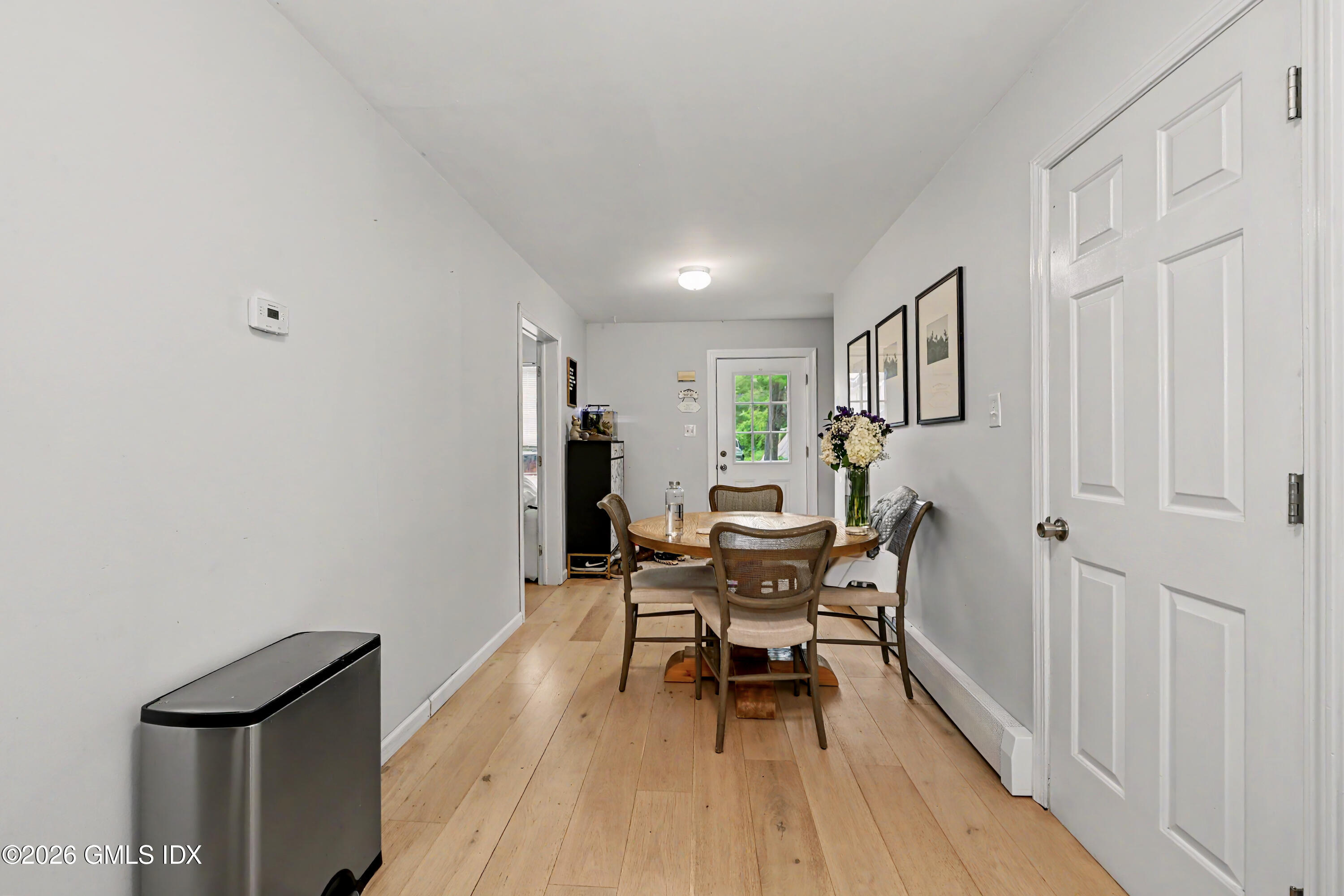 37 Prospect Street Greenwich, CT 06830 - Photo 7 of 41 a view of a livingroom with furniture and wooden floor