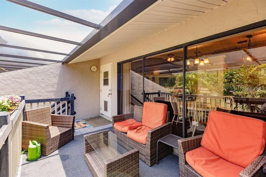 323 Bobby Jones Road, Unit 323 Sarasota, FL 34232 - Photo 4 of 10 a outdoor space with patio furniture