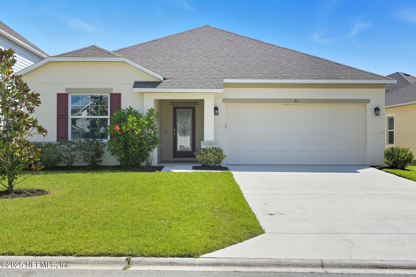 31 Ridge Road Palm Coast, FL 32137 - Photo 54 of 54 front