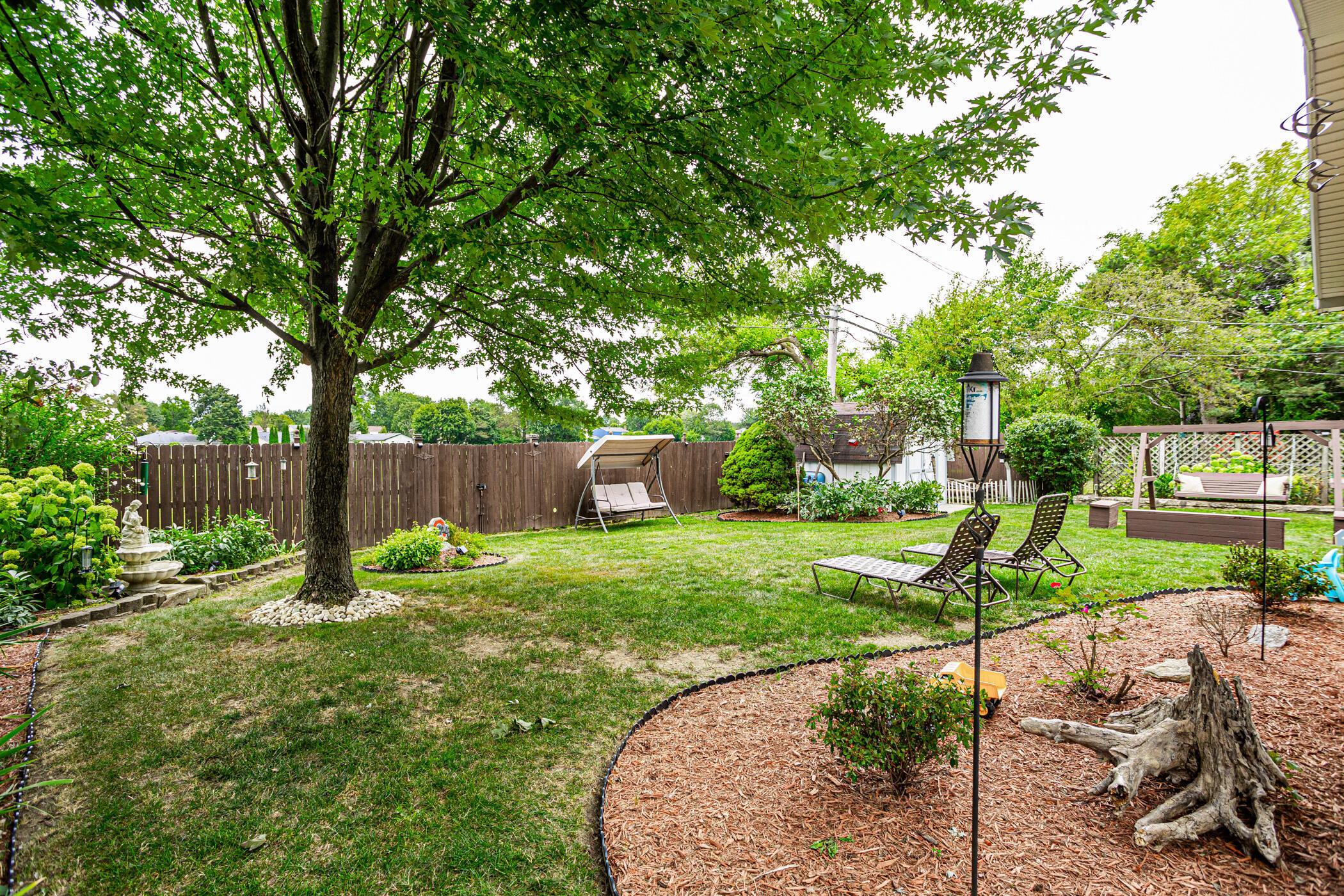 6330 Faircrest Road Columbus, OH 43229 - Photo 5 of 52 Relax in the parklike backyard!