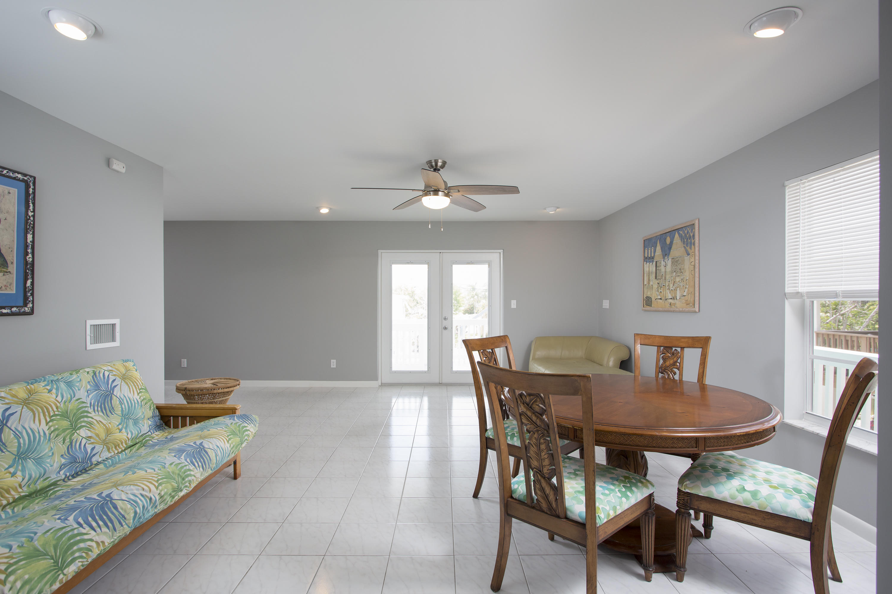 165 Cutlass Lane Cudjoe, FL 33042 - Photo 12 of 30 a view of a dining room with furniture and a window
