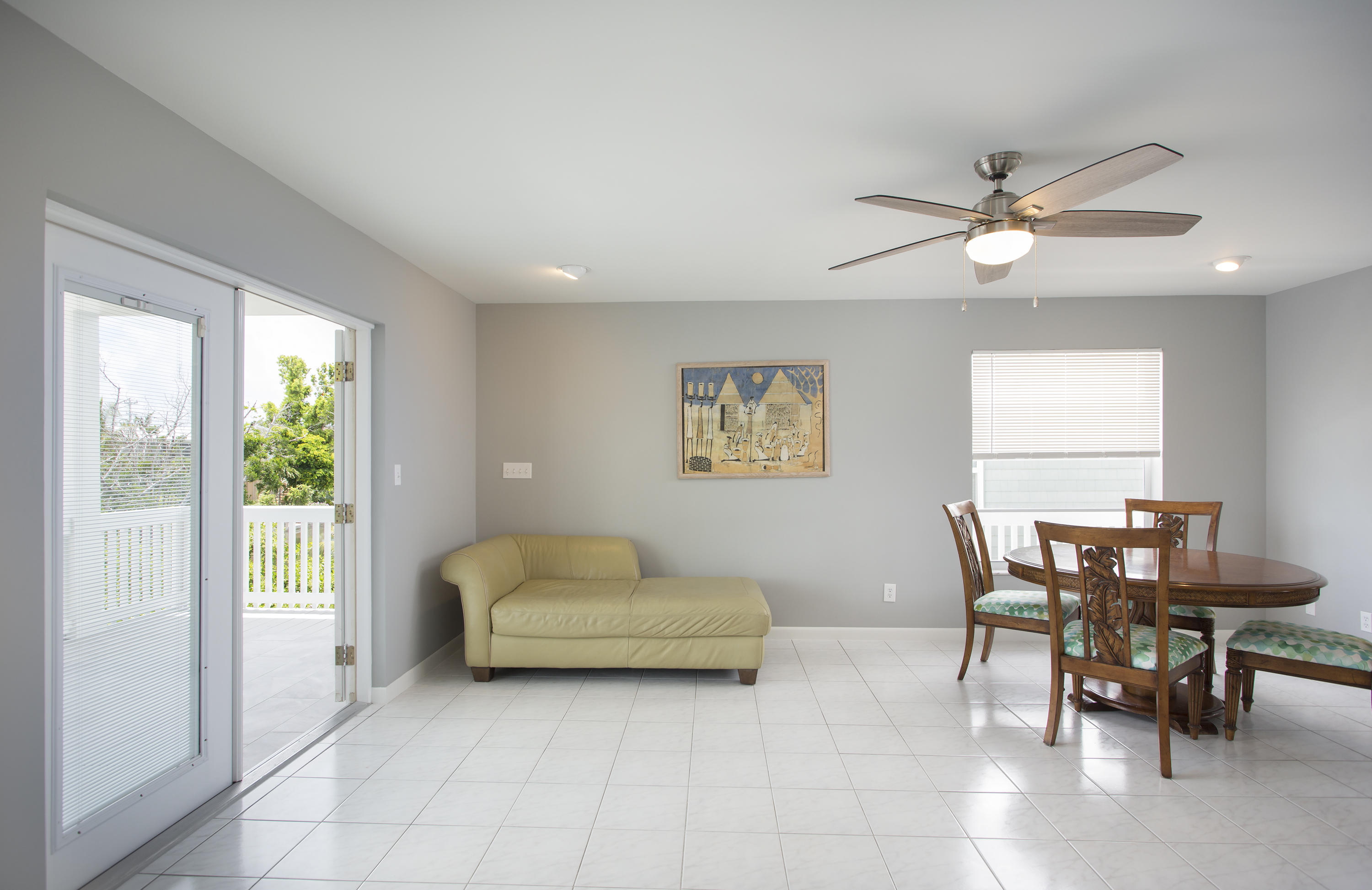 165 Cutlass Lane Cudjoe, FL 33042 - Photo 13 of 30 a living room with furniture and a large window