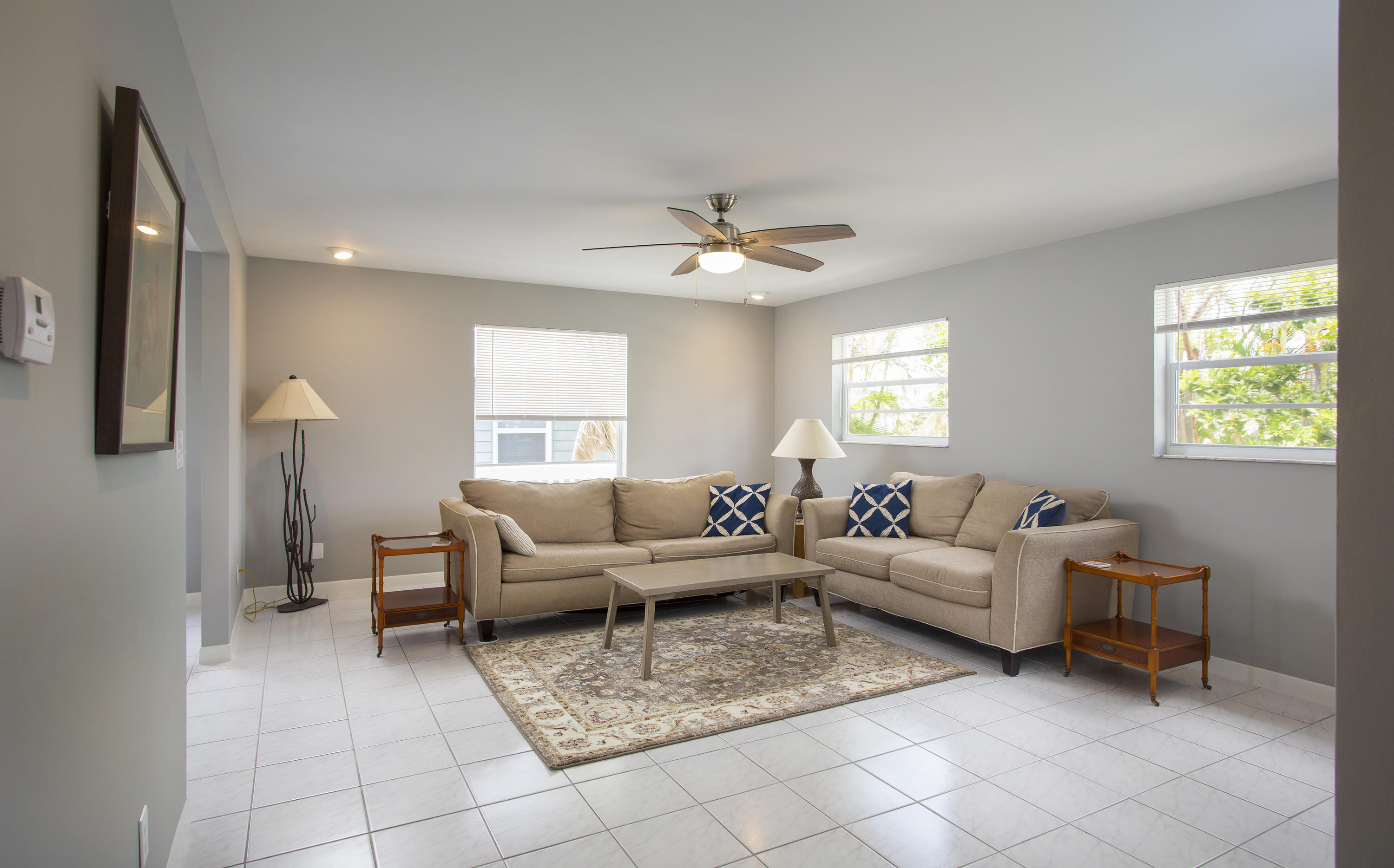 165 Cutlass Lane Cudjoe, FL 33042 - Photo 15 of 30 a living room with furniture and a chandelier