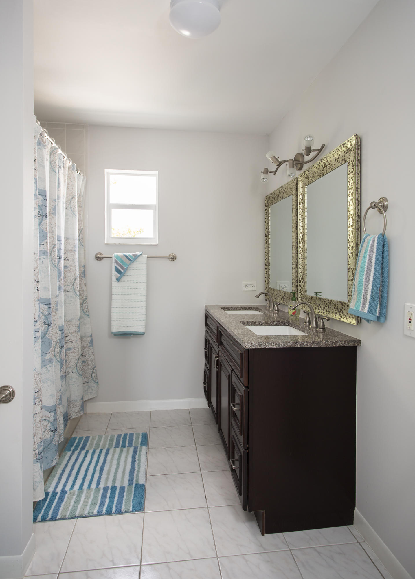 165 Cutlass Lane Cudjoe, FL 33042 - Photo 17 of 30 a bathroom with a sink and a mirror