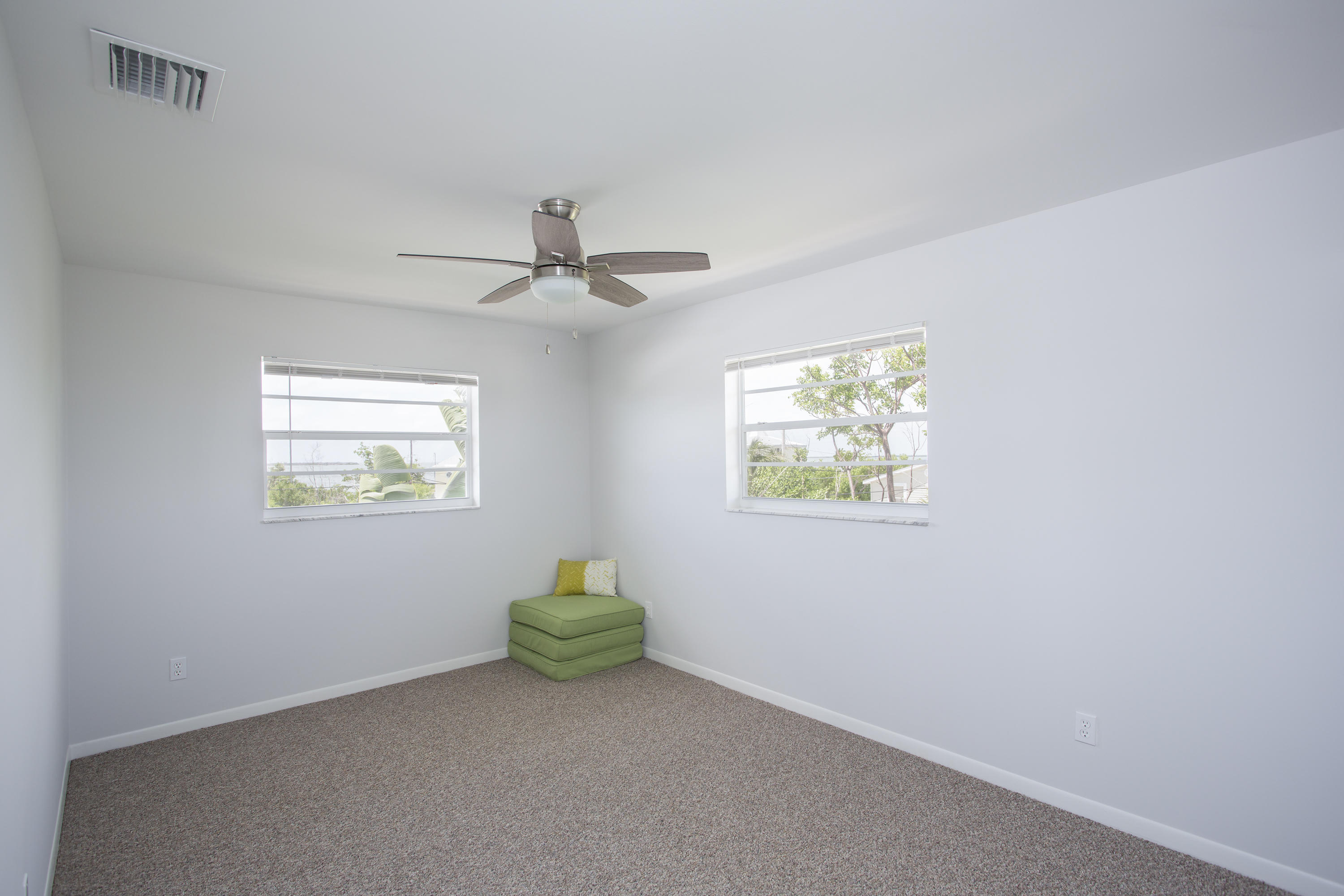 165 Cutlass Lane Cudjoe, FL 33042 - Photo 21 of 30 a view of an empty room with a window