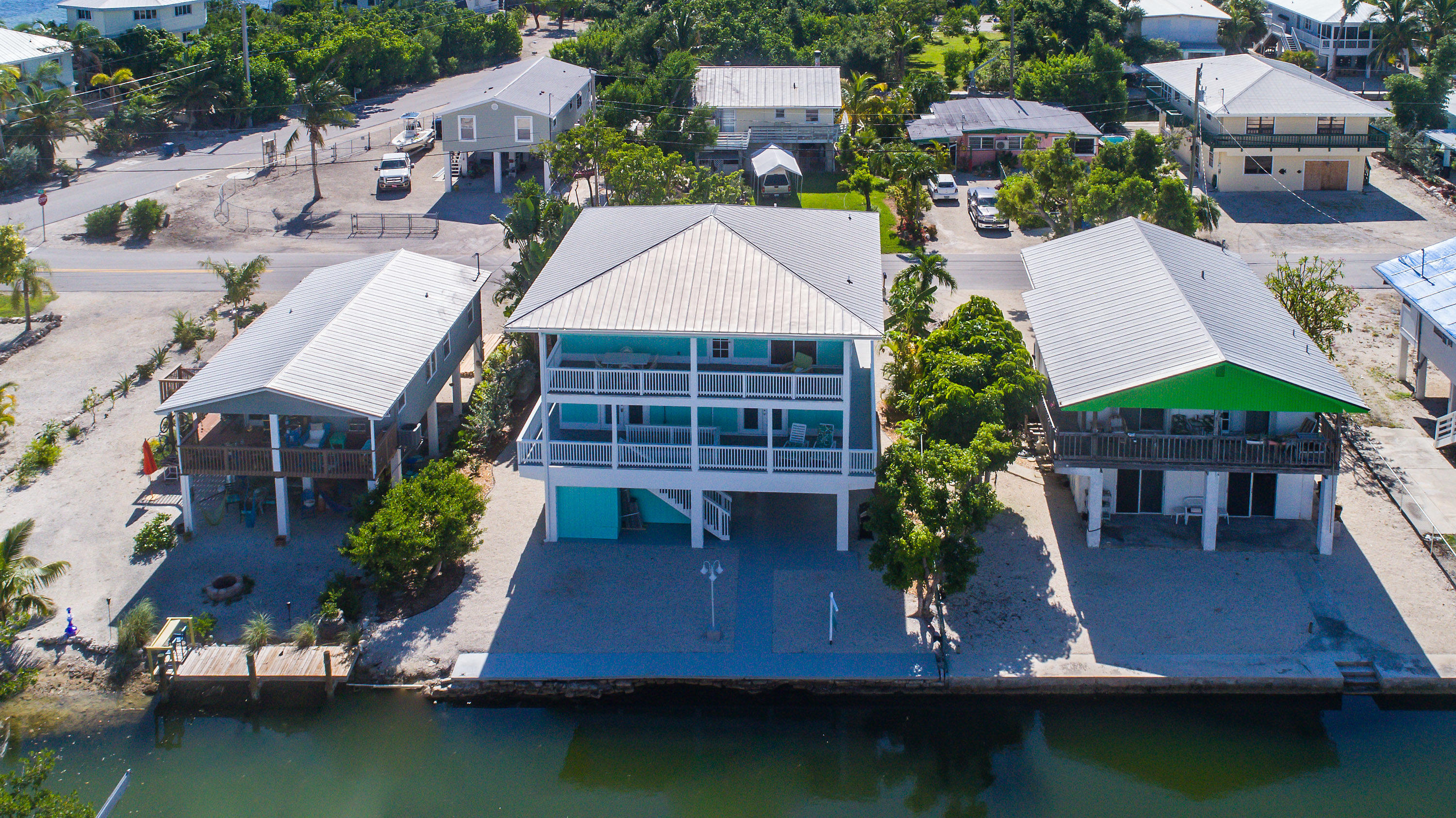 165 Cutlass Lane Cudjoe, FL 33042 - Photo 28 of 30 an aerial view of house with yard swimming pool and outdoor seating