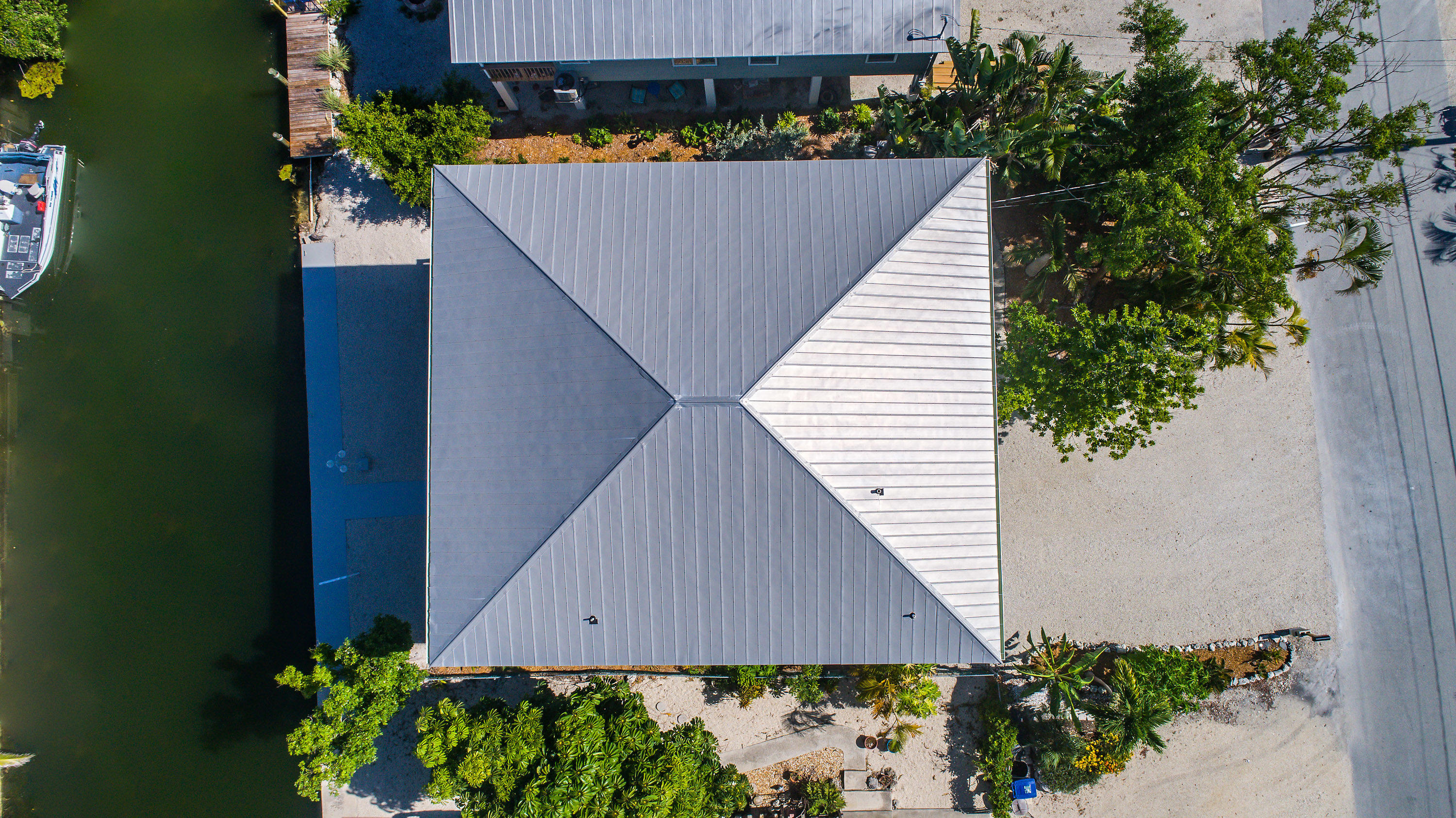 165 Cutlass Lane Cudjoe, FL 33042 - Photo 30 of 30 an aerial view of a house with a yard and potted plants