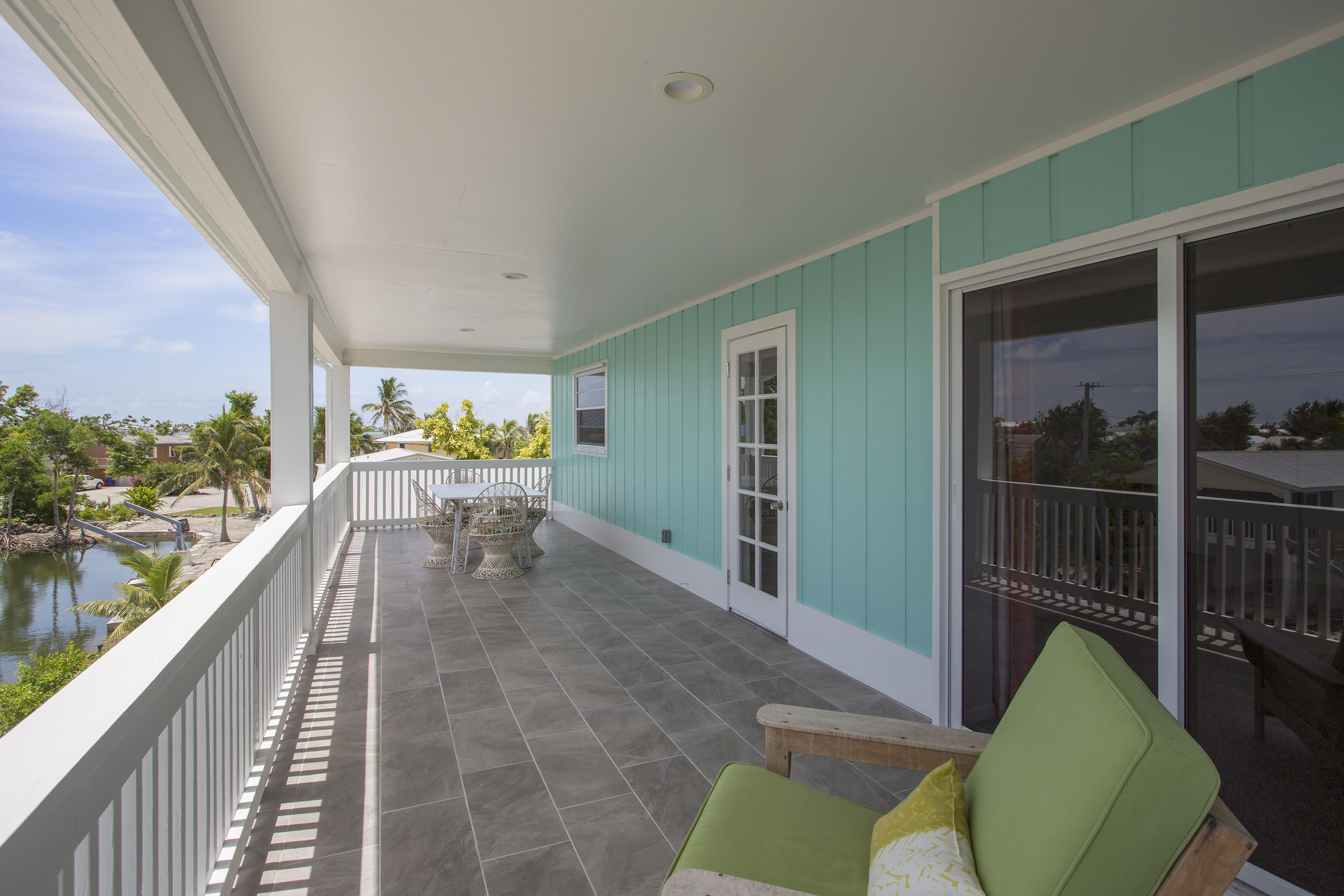 165 Cutlass Lane Cudjoe, FL 33042 - Photo 8 of 30 a view of balcony with couch
