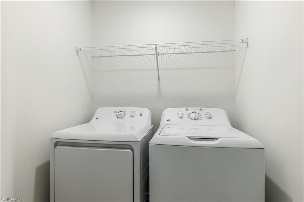 43985 Boardwalk Loop, Unit 2118 Punta Gorda, FL 33982 - Photo 16 of 32 a utility room with dryer and washer