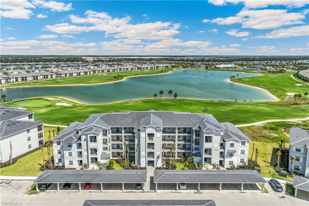 43985 Boardwalk Loop, Unit 2118 Punta Gorda, FL 33982 - Photo 2 of 32 an aerial view of a house with a garden