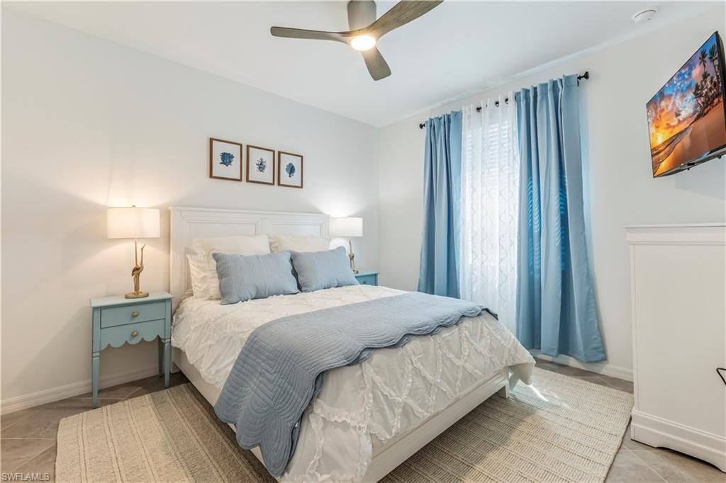 43985 Boardwalk Loop, Unit 2118 Punta Gorda, FL 33982 - Photo 10 of 32 a bedroom with a bed and a window