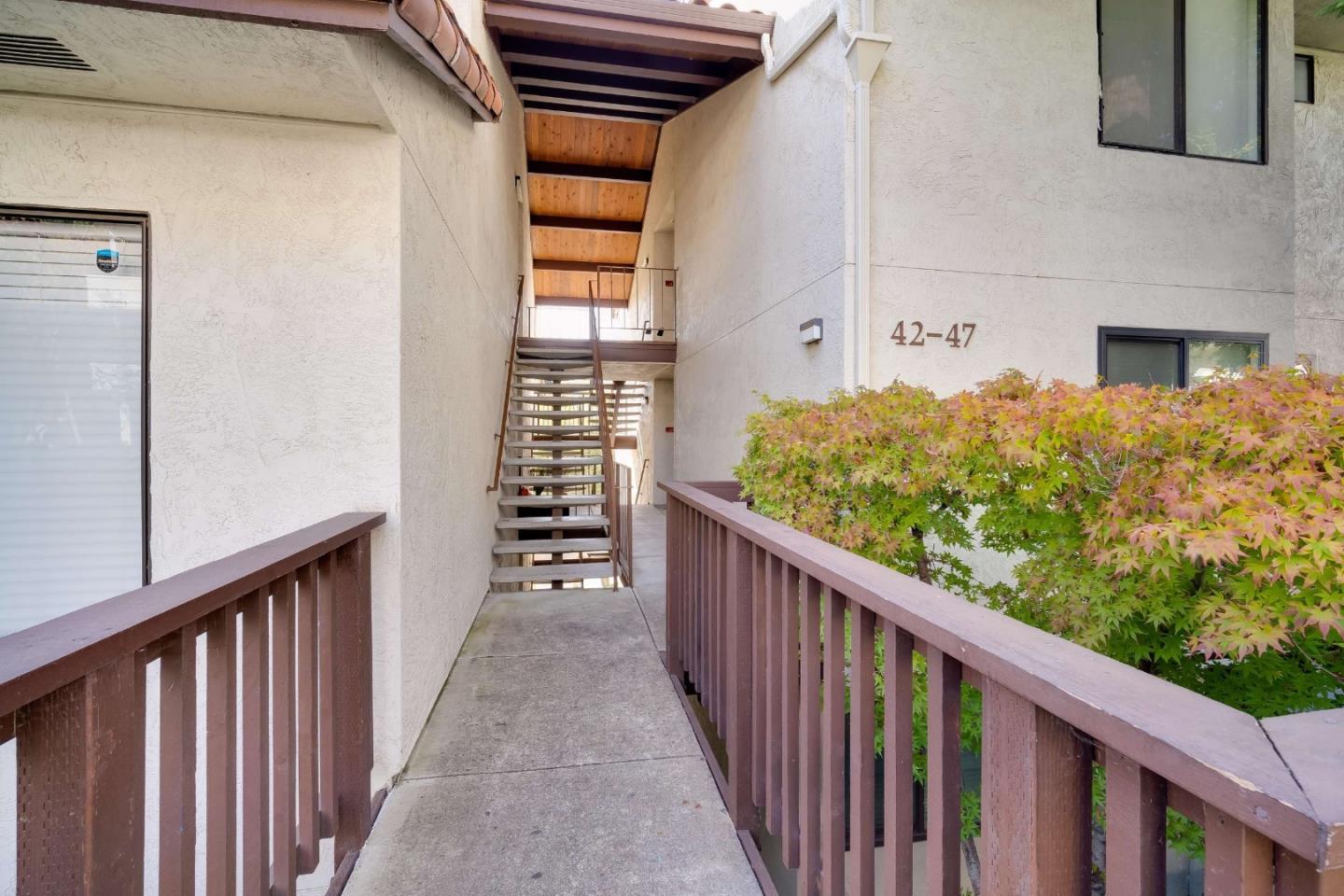 22135 Sevilla Road, Unit 47 Hayward, CA 94541 - Photo 2 of 37 a view of a balcony with wooden floor