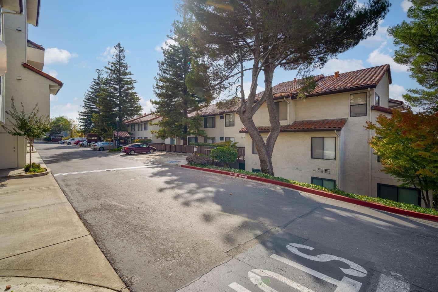22135 Sevilla Road, Unit 47 Hayward, CA 94541 - Photo 28 of 37 a view of a street with a building in the background