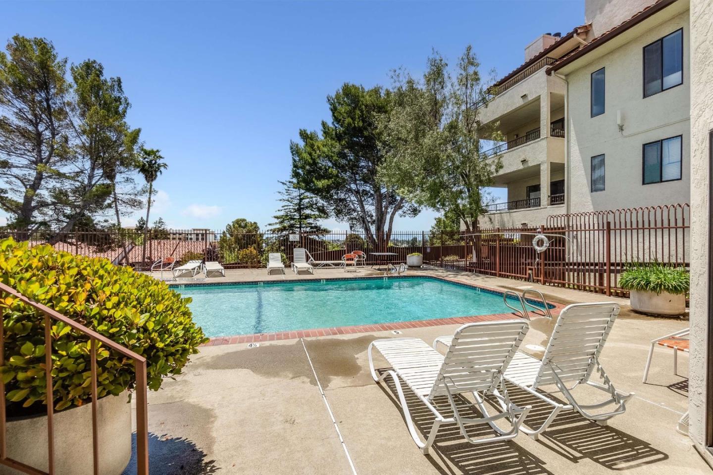 22135 Sevilla Road, Unit 47 Hayward, CA 94541 - Photo 33 of 37 a view of a patio with couches and table and chairs and potted plants