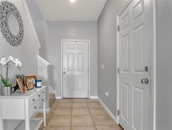 a view of kitchen with furniture and wooden floor