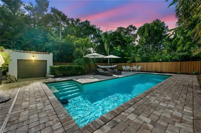a view of a backyard with a garden