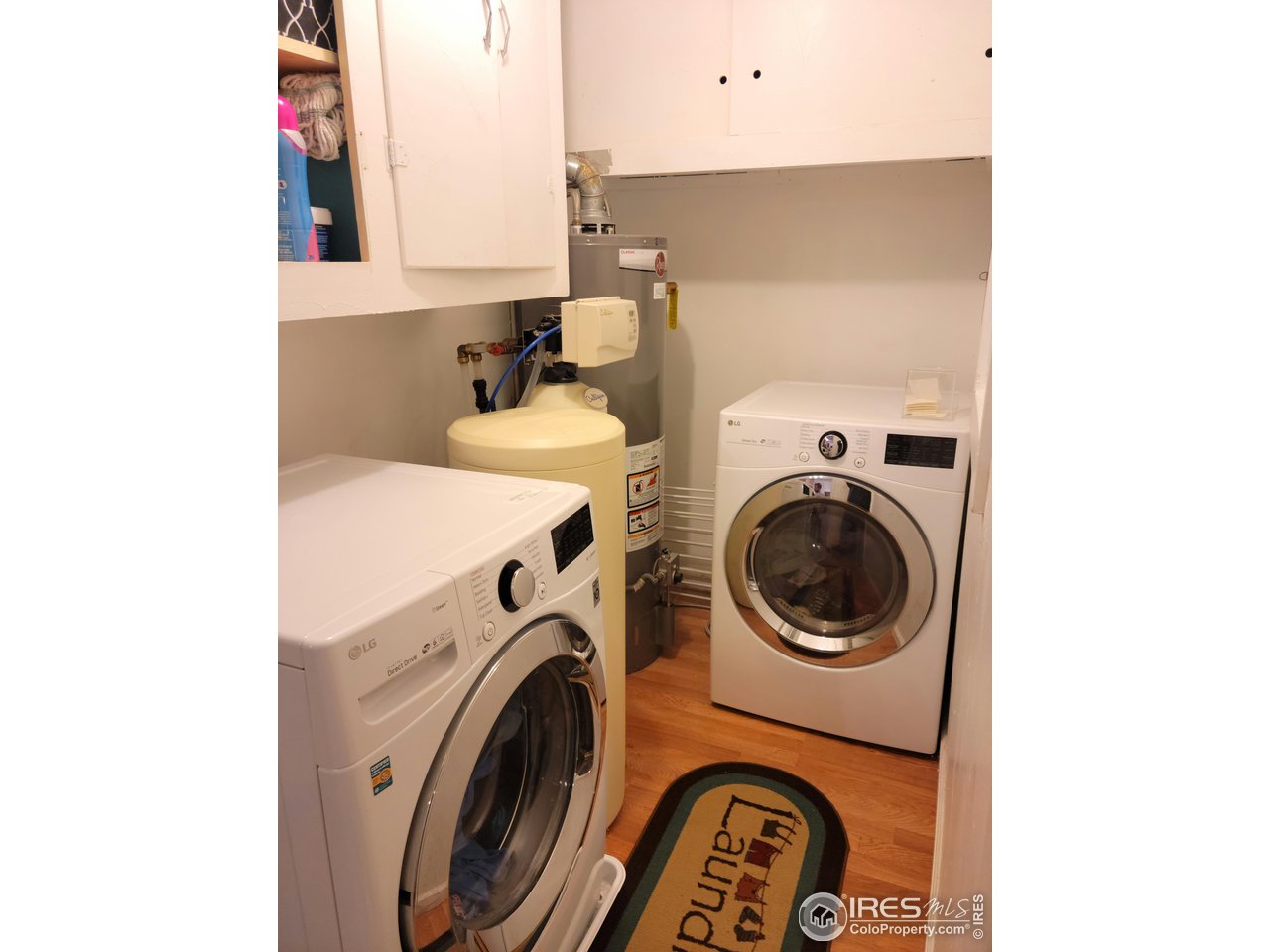 177 Delaware Drive Sterling, CO 80751 - Photo 11 of 13 a utility room with dryer and washer