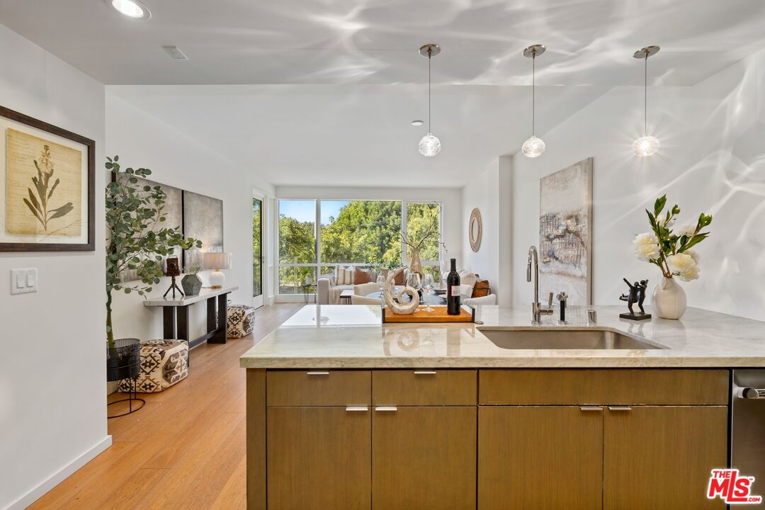 1705 Ocean Avenue, Unit 206 Santa Monica, CA 90401 - Photo 11 of 26 a view of a center kitchen island furniture