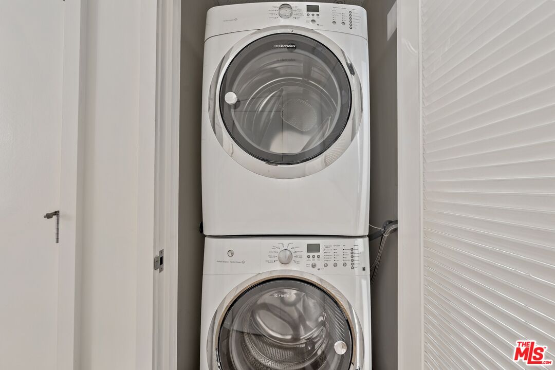 1705 Ocean Avenue, Unit 206 Santa Monica, CA 90401 - Photo 15 of 26 a close up view of a washer and dryer